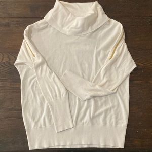 Luxurious cream and gold sweater